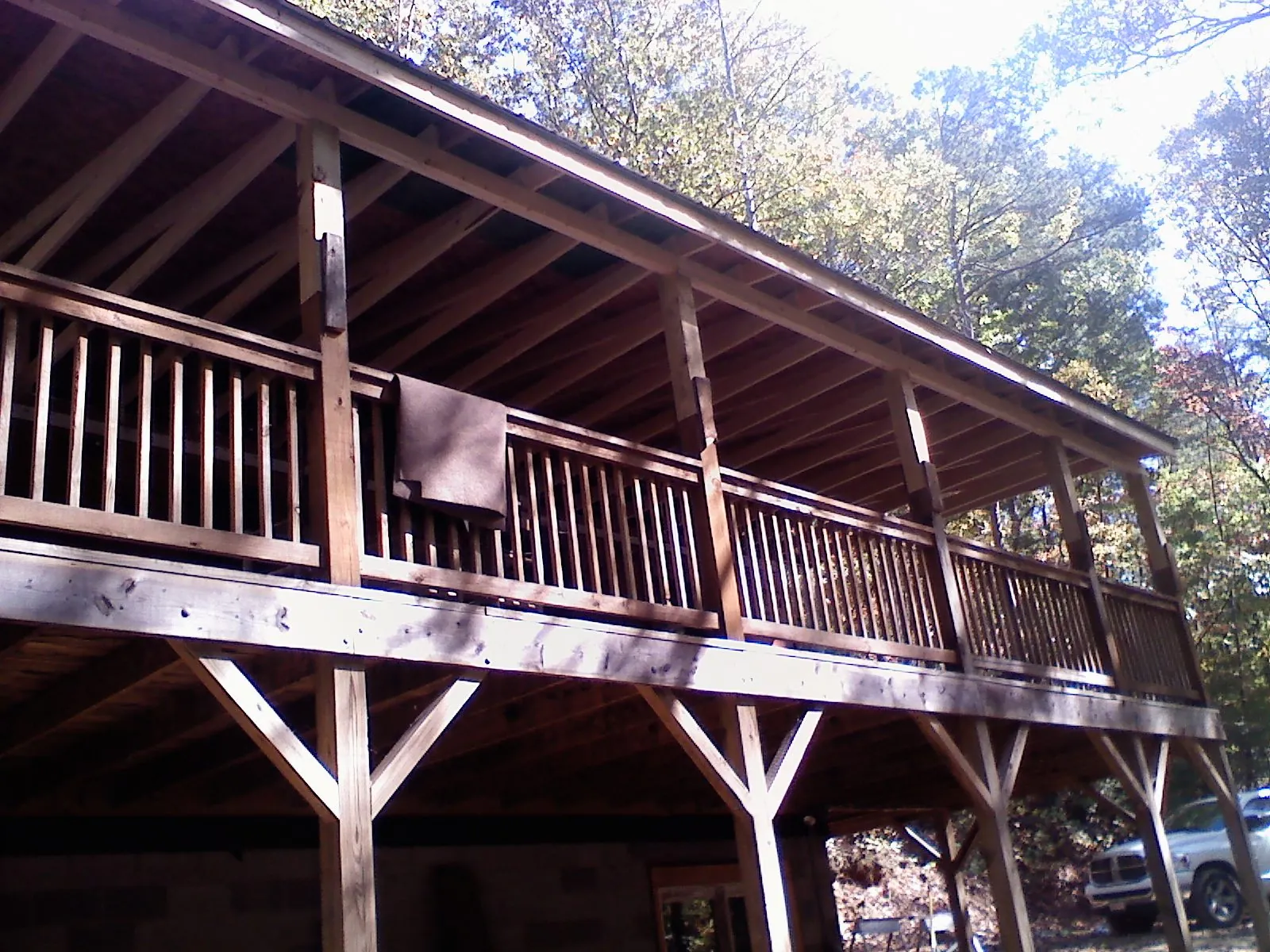 Timber framing under a new elevated porch and deck — Roof Leak Repair in Genoa City by Roofing Brothers